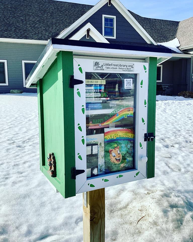 Lucky's The Magic Inside book inside a Little Free Library